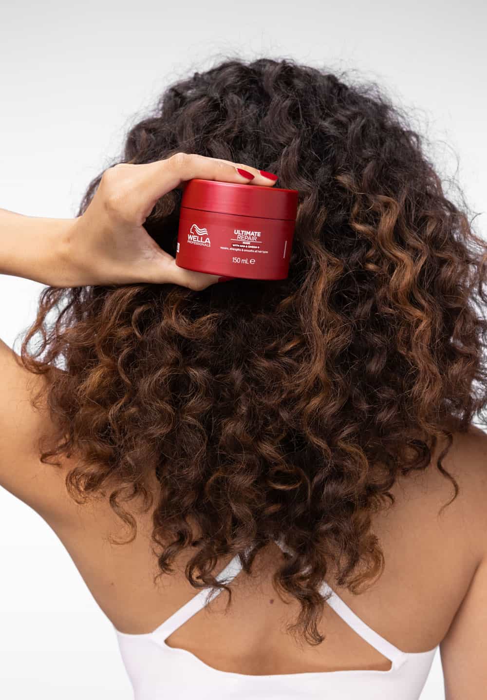 Hårmask för lockigt och torrt hår från Wella Professionals Ultimate Repair
